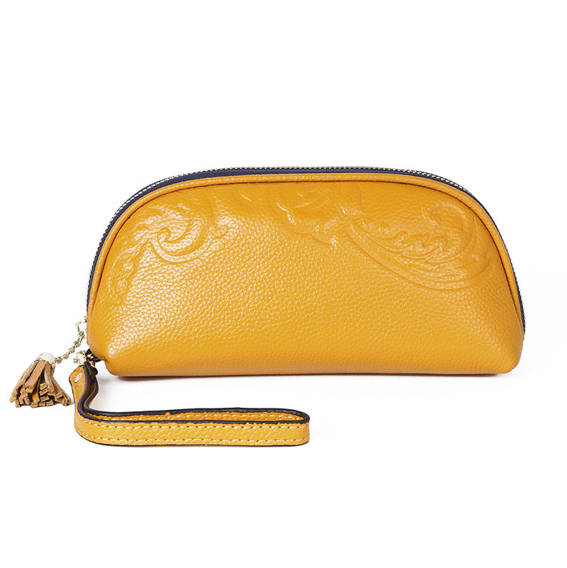 Retro leather women's handbag with embossed pattern and hand - polished finish