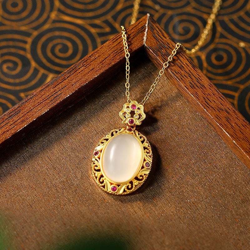Gold-plated Natural Chalcedony Auspicious Clouds Ruyi Hollow Egg Surface Sachet Pendant Necklace for Women