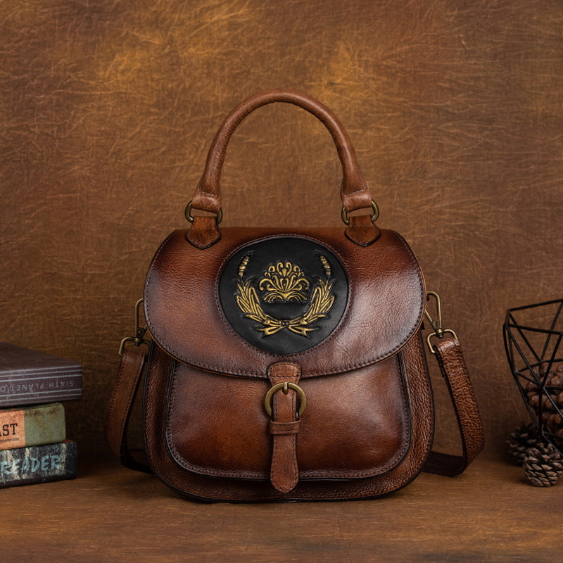 Vintage Cowhide Women's Multi-purpose Vegetable Tanned Leather Hand Backpack with Embossed Design