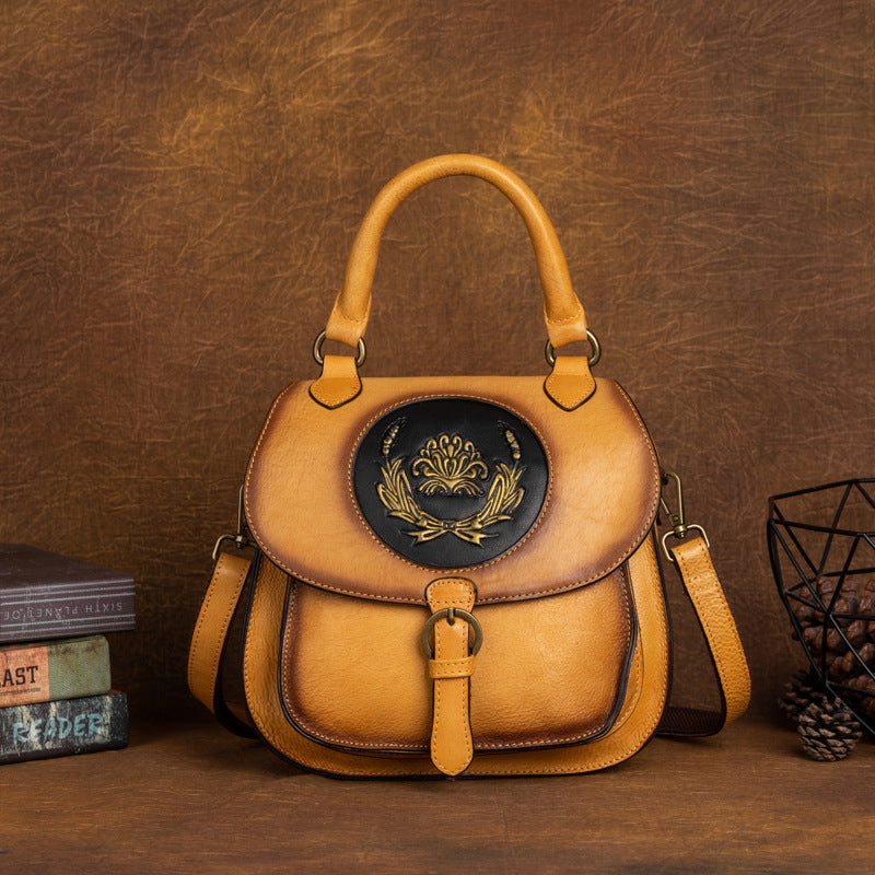 Vintage Cowhide Women's Multi-purpose Vegetable Tanned Leather Hand Backpack with Embossed Design