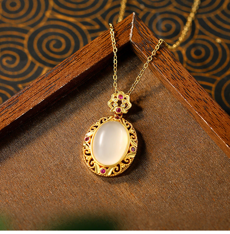 Gold-plated Natural Chalcedony Auspicious Clouds Ruyi Hollow Egg Surface Sachet Pendant Necklace for Women