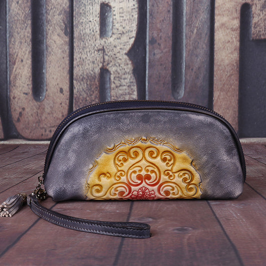 Retro leather women's handbag with embossed pattern and hand - polished finish