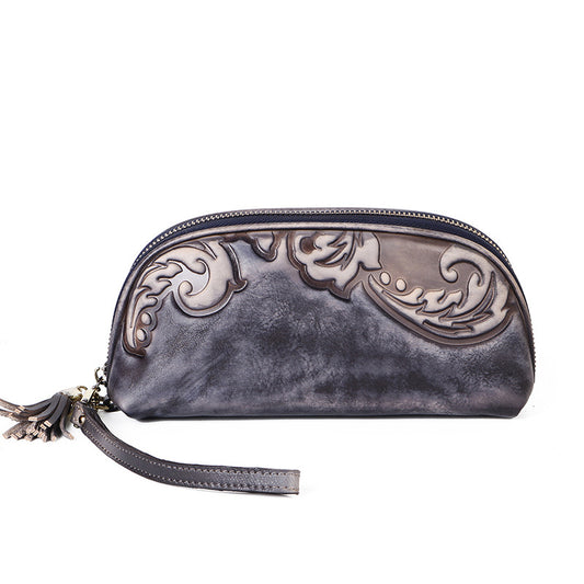 Retro leather women's handbag with embossed pattern and hand - polished finish