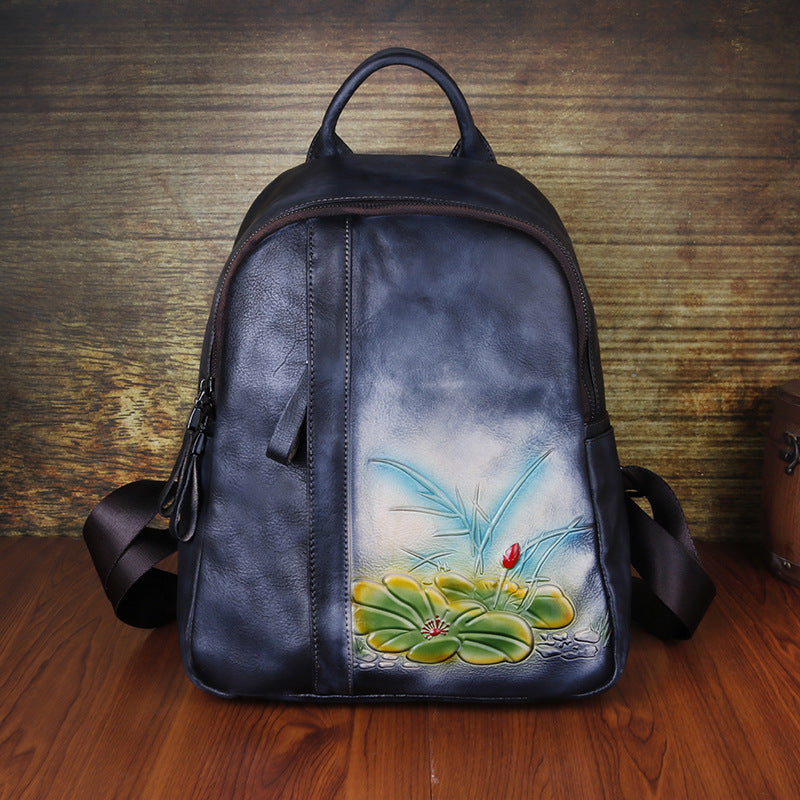 Retro Genuine Leather Women's Backpack with Embossed Design and Large Capacity