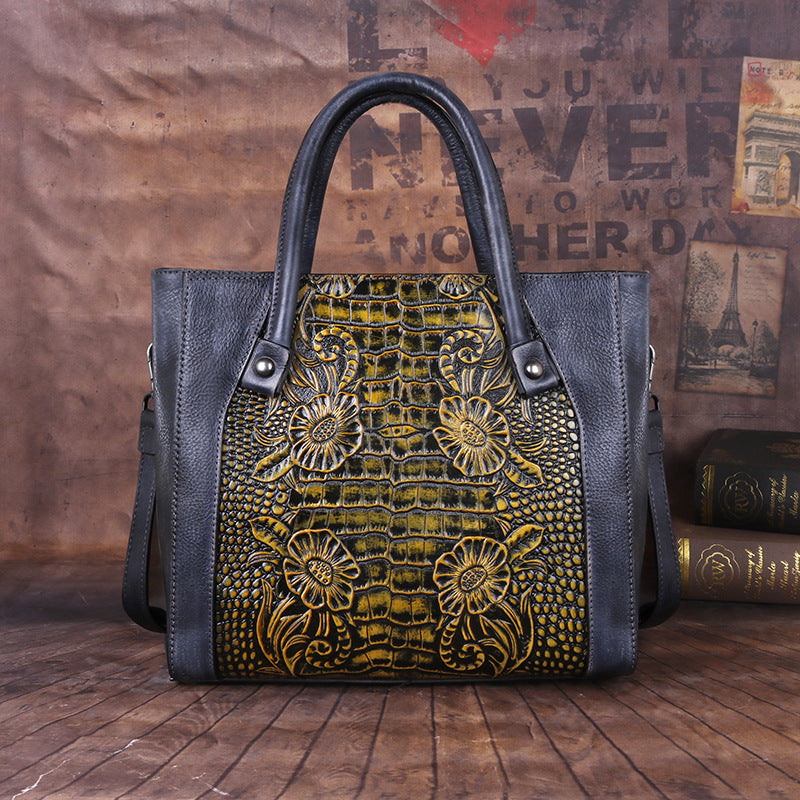 Women's Retro Fashion Embossed Vegetable Tanned Leather Portable Diagonal Bucket Bag