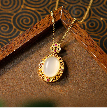 Gold-plated Natural Chalcedony Auspicious Clouds Ruyi Hollow Egg Surface Sachet Pendant Necklace for Women